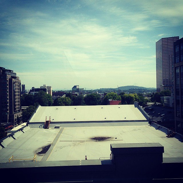 Lunch with a rooftop view. If you look carefully you can see #mthood